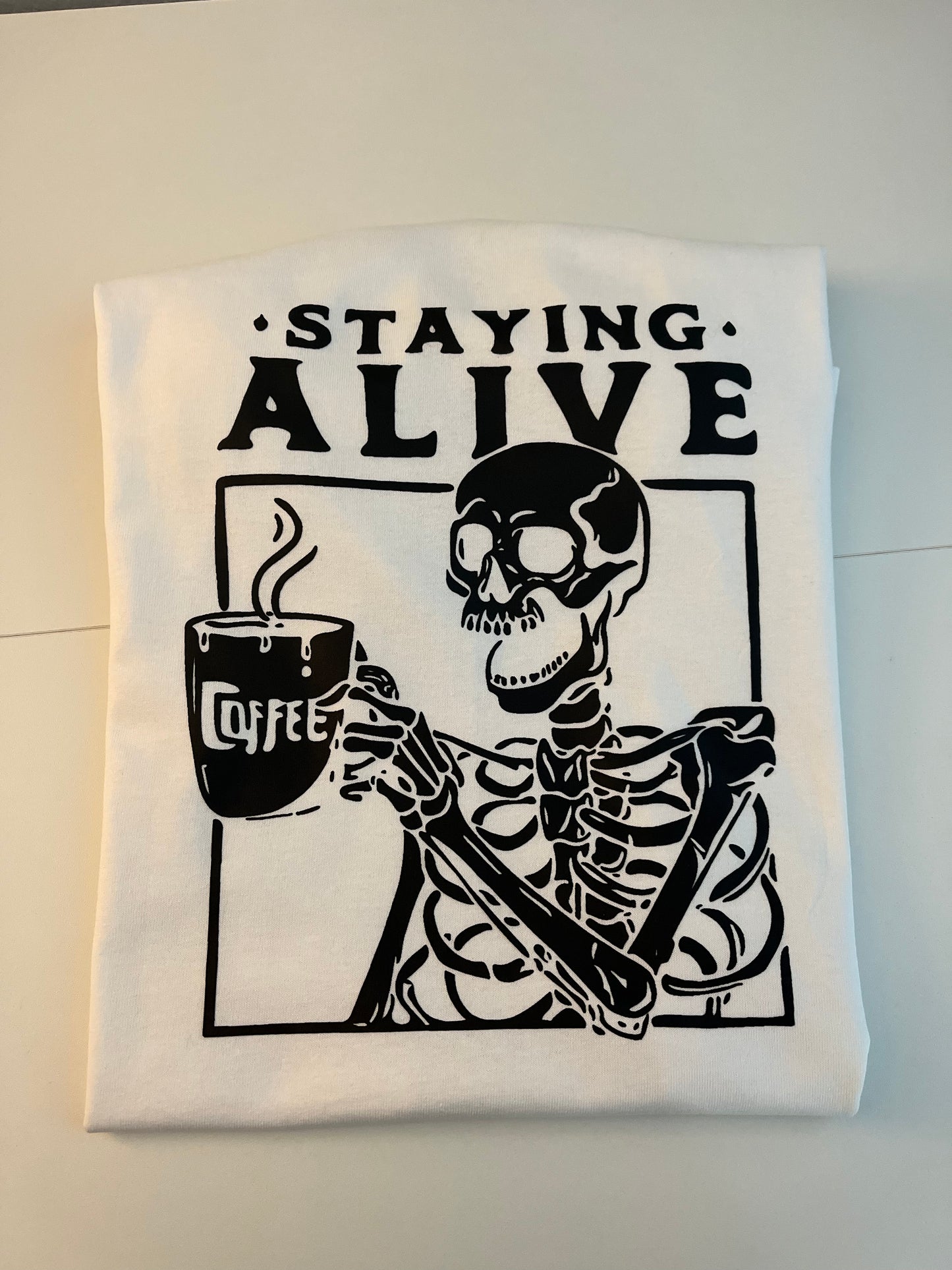 PRE-ORDER: Staying Alive Coffee Tee